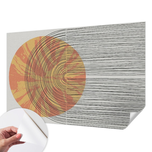 Stick-on wall mural with a circular motif and linear accents