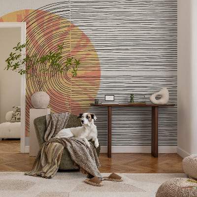 Stick-on wall mural with a circular motif and linear accents