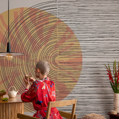 Stick-on wall mural with a circular motif and linear accents