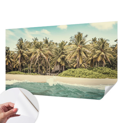 Nursery wall mural with a tropical beach design