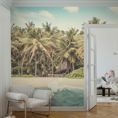 Nursery wall mural with a tropical beach design