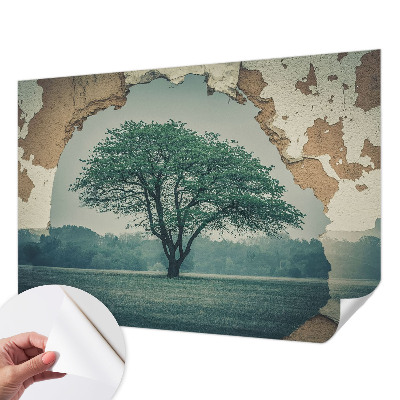 Removable wall mural featuring a solitary tree design