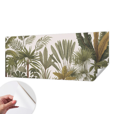 Baby room wall mural with an exotic leaves motif