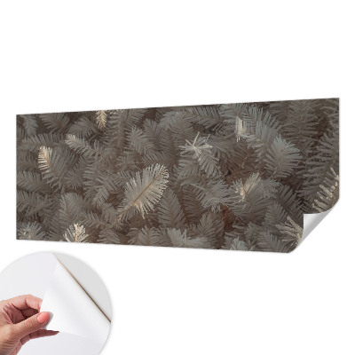 Peel-and-stick wall mural with a frosty twigs design for the living room