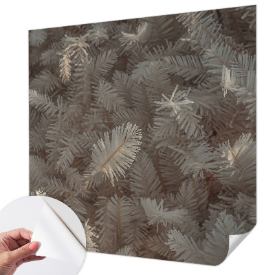 Peel-and-stick wall mural with a frosty twigs design for the living room