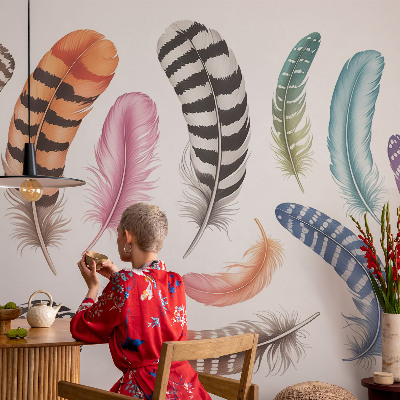 Nursery wall mural with a pastel feather pattern