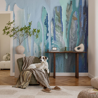 Nursery wall mural with a blue cascading water design