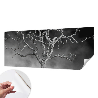 Nursery wall mural with a misty tree design