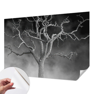 Nursery wall mural with a misty tree design