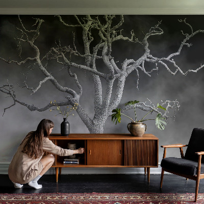Nursery wall mural with a misty tree design