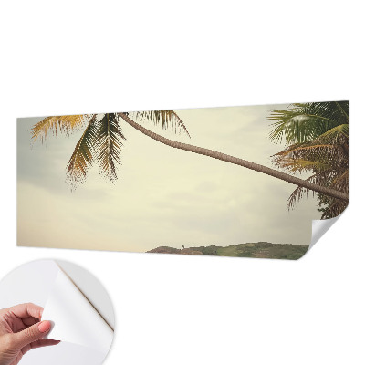 Nursery wall mural with a tropical landscape design