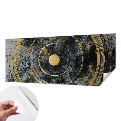 Removable wall mural with a cosmic dynamics design