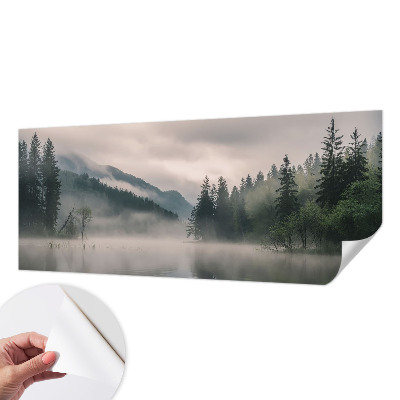 Peel and stick wall mural with an atmospheric lake scene