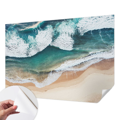 Peel and stick wall mural with a sea waves design