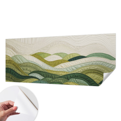 Stick-on wall mural featuring a fabric hills design