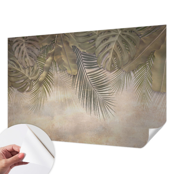 Baby room wall mural with a tropical leaves motif