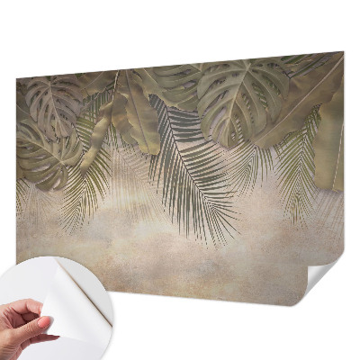 Baby room wall mural with a tropical leaves motif