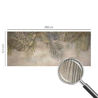 Baby room wall mural with a tropical leaves motif