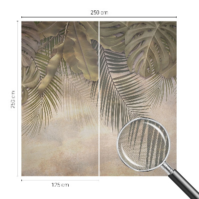 Baby room wall mural with a tropical leaves motif