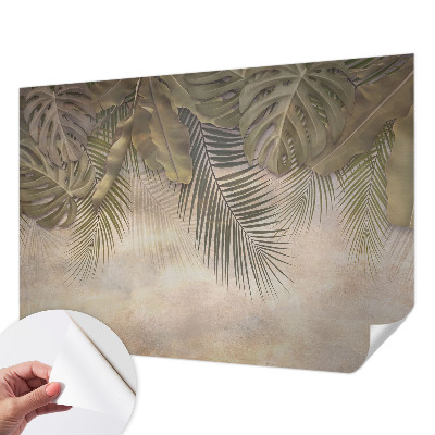 Baby room wall mural with a tropical leaves motif