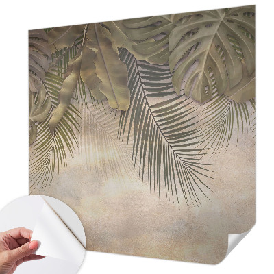 Baby room wall mural with a tropical leaves motif