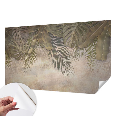 Baby room wall mural with a tropical leaves motif