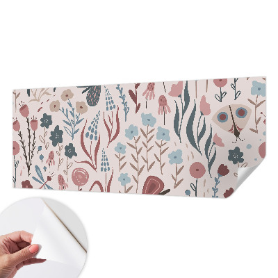 Children's wall mural with a floral and insect motif