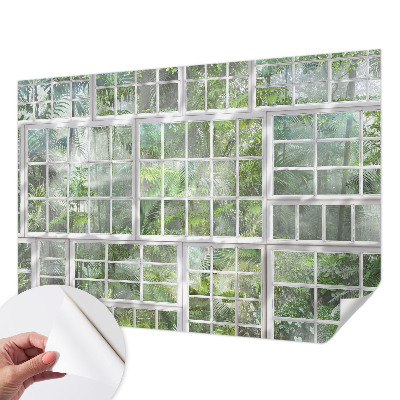 Children's wall mural with a green forest design