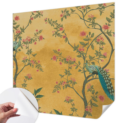 Peel and stick wall mural with a peacock tree design