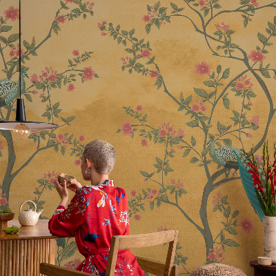 Peel and stick wall mural with a peacock tree design