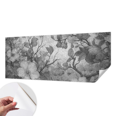 Removable wall mural with a floral branch design