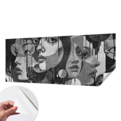 Baby room wall mural with a pattern of women's faces suitable for a nursery