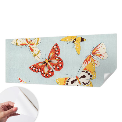 Nursery wall mural with an artistic butterflies motif