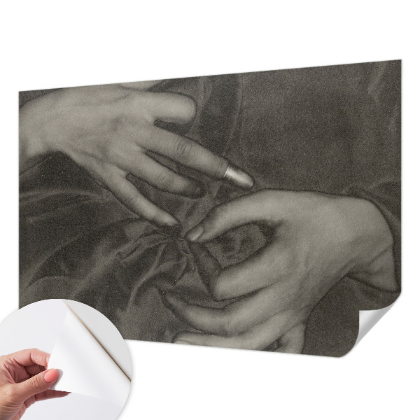 Removable wall mural with a hands motif made from a soft, removable material