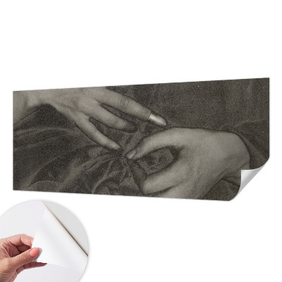 Removable wall mural with a hands motif made from a soft, removable material