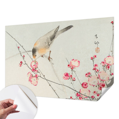 Peel and stick wall mural with a floral and bird design