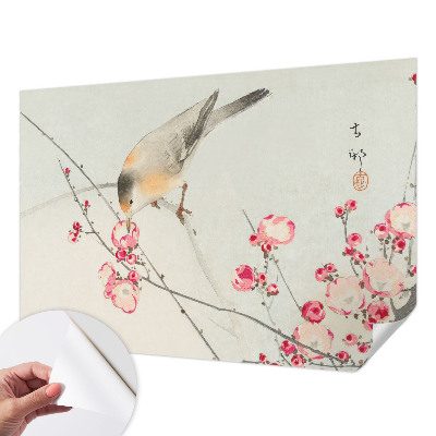 Peel and stick wall mural with a floral and bird design