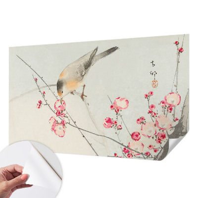 Peel and stick wall mural with a floral and bird design