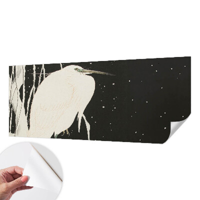 Peel and stick wall mural with a winter bird design