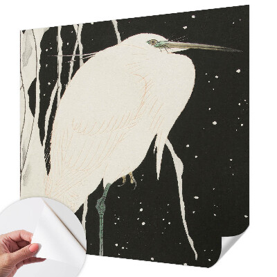 Peel and stick wall mural with a winter bird design