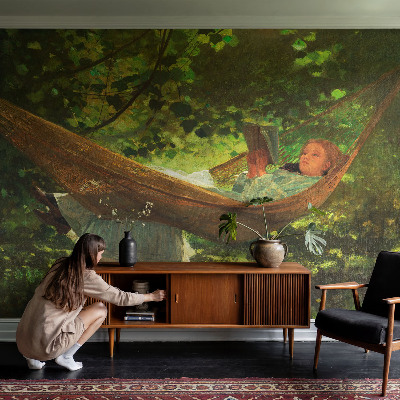 Stick-on wall mural relaxing in a hammock design