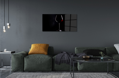 Acrylic print Black background with a glass of wine