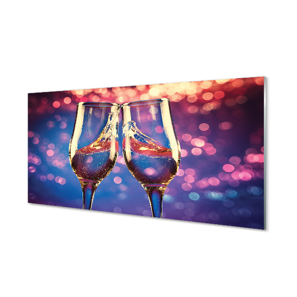 Acrylic print Glasses of champagne colored background