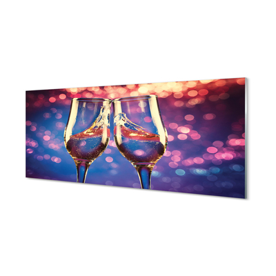 Acrylic print Glasses of champagne colored background
