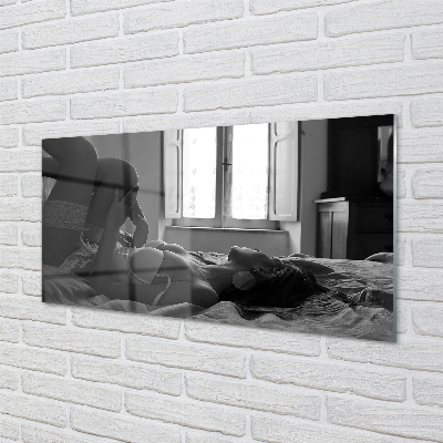 Acrylic print Woman lying on the window