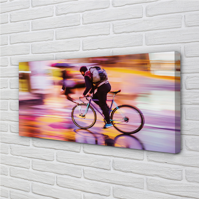Canvas print Lights bicycle man