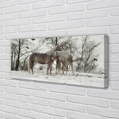 Canvas print Unicorns winter forest