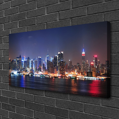 Canvas print City skyscrapers houses blue red
