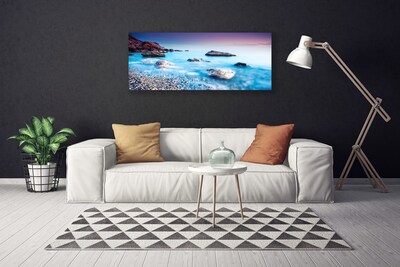 Canvas print Sea stones beach landscape blue grey pink