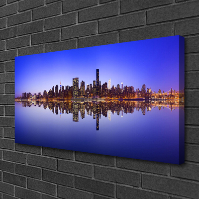 Canvas print City water houses blue brown white